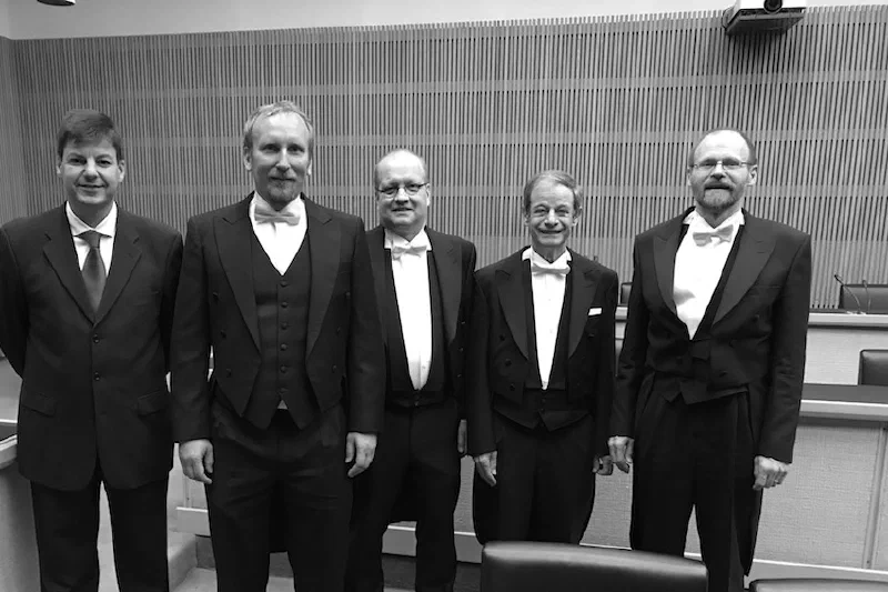 Konsta Mikael Sirvio with the custos and opponents at his doctoral defence